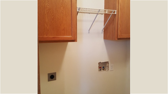 Laundry room with washer/dryer hookups